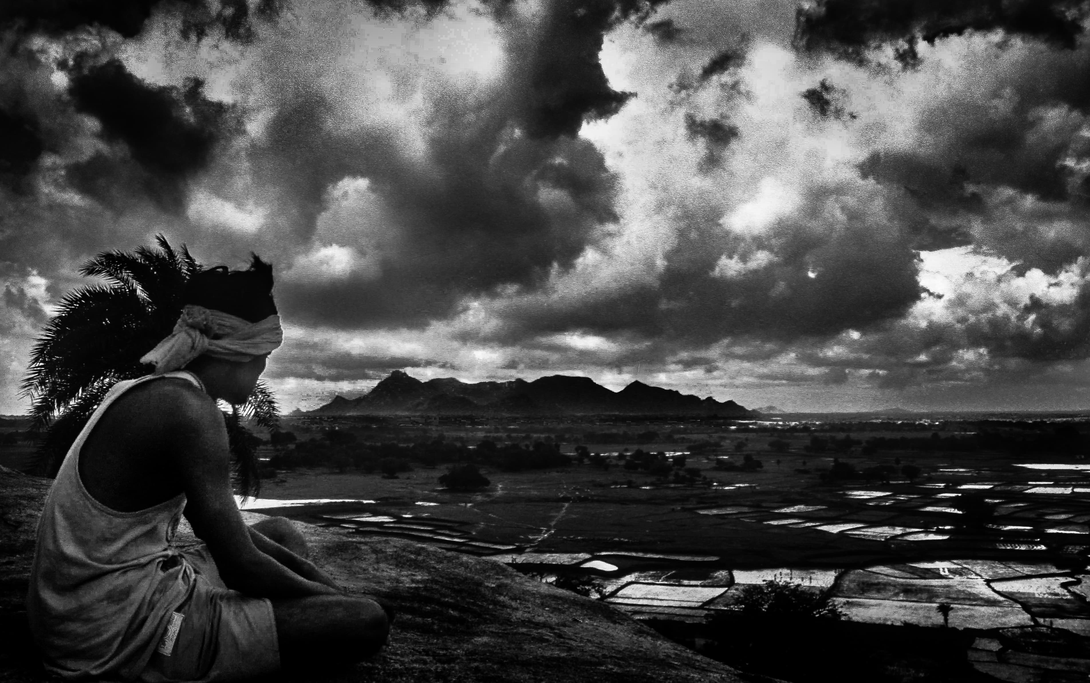 Man overlooking the landscape at Tapovan